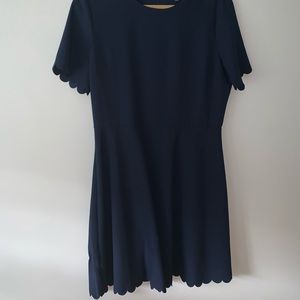 Navy dress with detailed hem